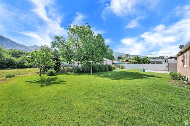 506 N 100 E, Brigham City, UT 84302 - fenced backyard with a mountain view