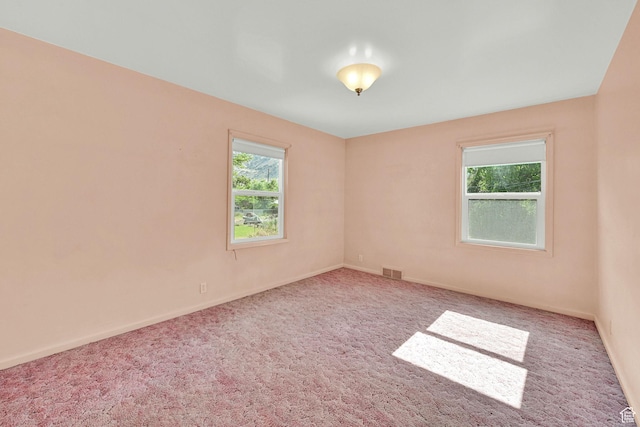 506 N 100 E, Brigham City, UT 84302 - carpeted empty room with baseboards