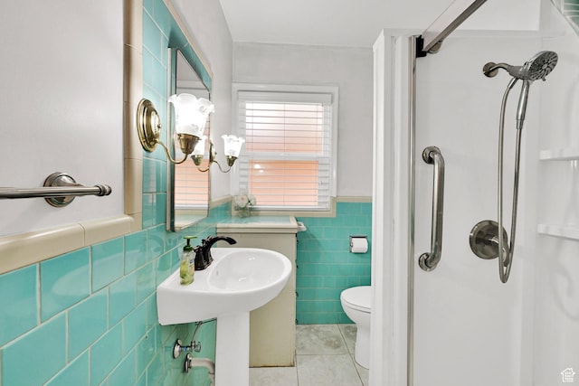 506 N 100 E, Brigham City, UT 84302 - bathroom featuring tile walls, tile patterned flooring, a shower stall, wainscoting, and a chandelier