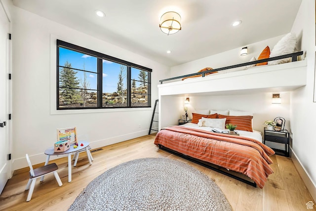 2225 Elk Meadows Cir, Woodland, UT 84036 - bedroom featuring light wood-type flooring and recessed lighting