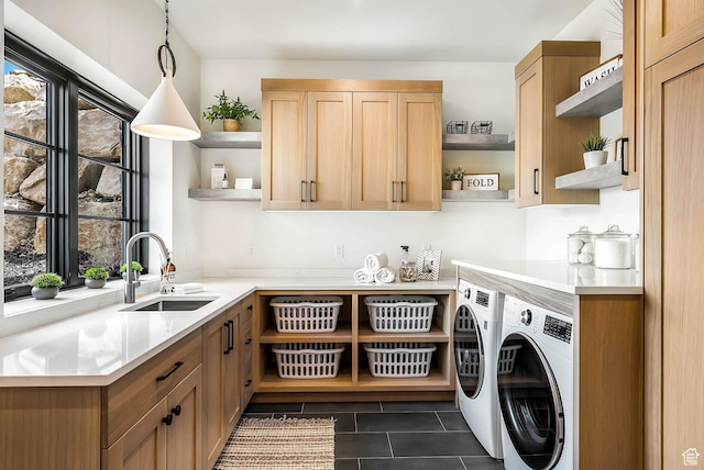 2225 Elk Meadows Cir, Woodland, UT 84036 - laundry room featuring washing machine and dryer, cabinet space, and dark tile patterned flooring