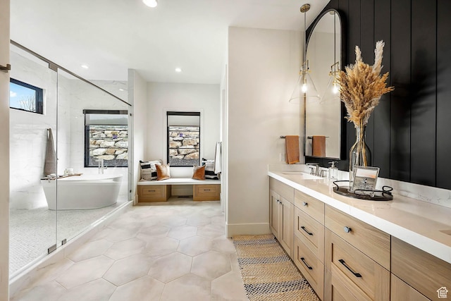2225 Elk Meadows Cir, Woodland, UT 84036 - bathroom featuring a soaking tub, vanity, tile patterned flooring, recessed lighting, and a shower
