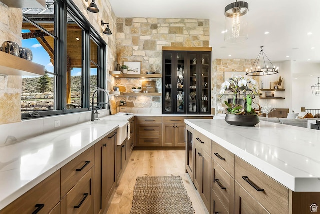 2225 Elk Meadows Cir, Woodland, UT 84036 - bar with hanging light fixtures and a chandelier
