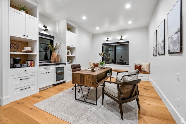 2225 Elk Meadows Cir, Woodland, UT 84036 - home office with wine cooler, light wood-type flooring, and recessed lighting