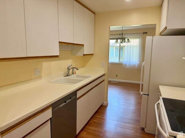 34 S El Dorado Pl, West Jordan, UT 84088 - kitchen featuring stainless steel dishwasher, electric stove, white cabinets, wood finished floors, and a chandelier