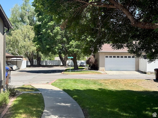 34 S El Dorado Pl, West Jordan, UT 84088 - view of yard featuring a garage