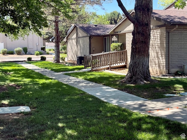 34 S El Dorado Pl, West Jordan, UT 84088 - view of front of home featuring a front yard and a shingled roof