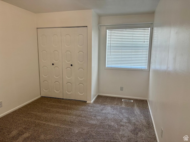 34 S El Dorado Pl, West Jordan, UT 84088 - unfurnished bedroom with carpet floors and a closet