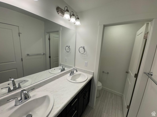 1668 N 1600 W Unit 128, Layton, UT 84041 - full bathroom with double vanity and tile patterned floors