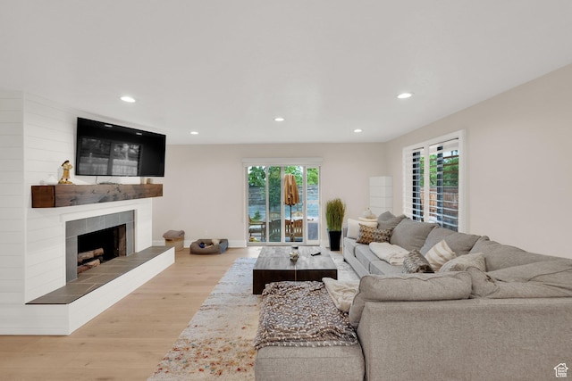 2345 E High Mountain Dr, Sandy, UT 84092 - living area featuring wood finished floors, recessed lighting, and a tile fireplace
