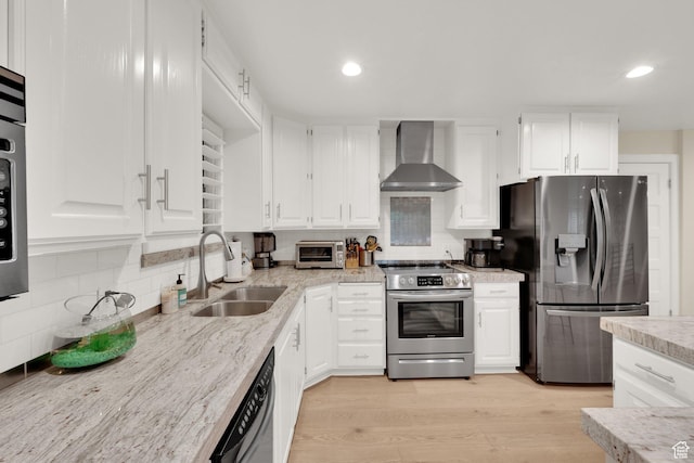 2345 E High Mountain Dr, Sandy, UT 84092 - kitchen featuring wall chimney range hood, stainless steel appliances, decorative backsplash, white cabinets, and recessed lighting
