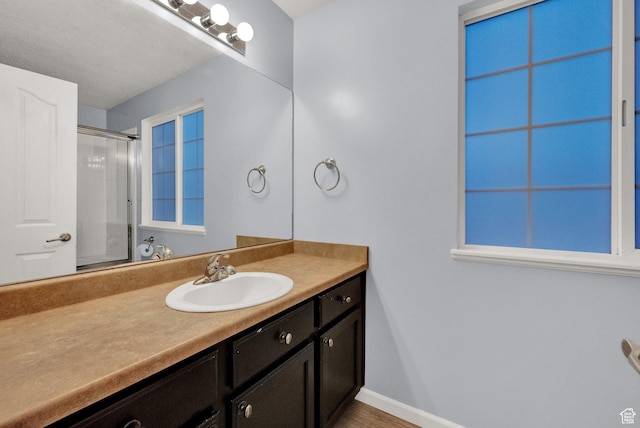 8728 S Black Diamond Cv W, West Jordan, UT 84081 - bathroom with vanity and a shower with door