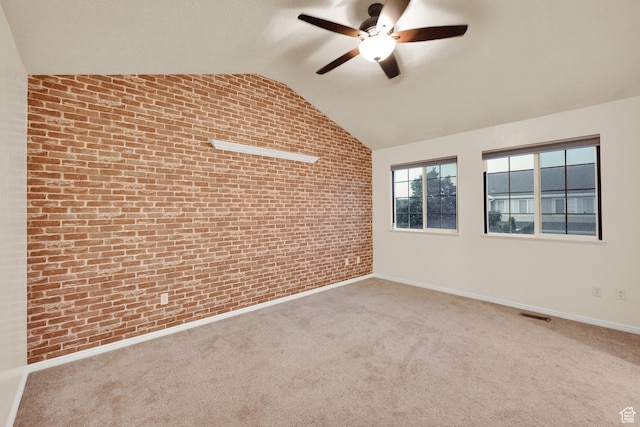 8728 S Black Diamond Cv W, West Jordan, UT 84081 - carpeted empty room with brick wall, ceiling fan, and vaulted ceiling
