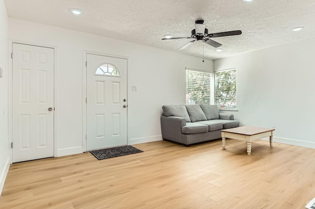 180 E Ross Dr, Clearfield, UT 84015 - entrance foyer featuring light wood-style floors, healthy amount of natural light, a textured ceiling, ceiling fan, and recessed lighting