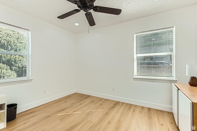 180 E Ross Dr, Clearfield, UT 84015 - unfurnished room with light wood-style floors, ceiling fan, and recessed lighting