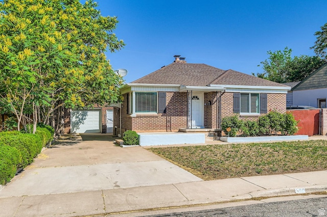 180 E Ross Dr, Clearfield, UT 84015 - bungalow-style house with brick siding, driveway, a garage, and an outdoor structure