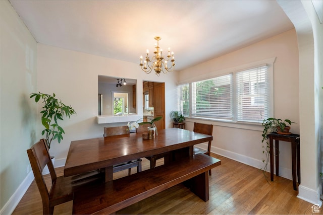 1021 E 800 S, Salt Lake City, UT 84102 - dining area featuring a chandelier and light wood-type flooring