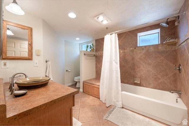 1021 E 800 S, Salt Lake City, UT 84102 - bathroom with plenty of natural light, shower / bathtub combination with curtain, vanity, tile patterned floors, and recessed lighting