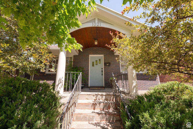 1021 E 800 S, Salt Lake City, UT 84102 - doorway to property featuring brick siding and a porch