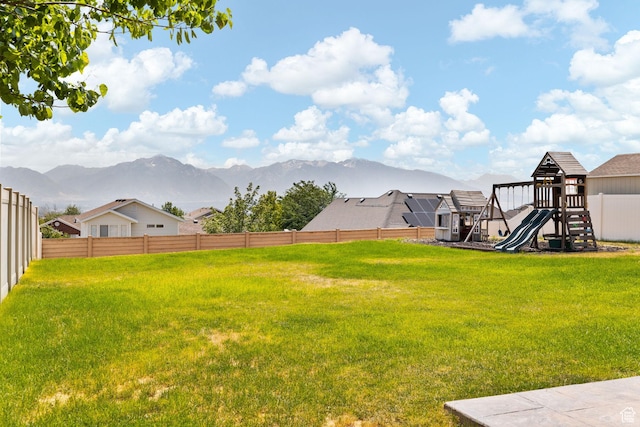 6959 S Adventure Way, West Jordan, UT 84081 - view of yard featuring a playground and a mountain view