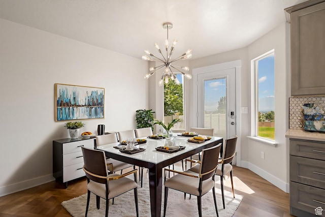 6959 S Adventure Way, West Jordan, UT 84081 - dining area with baseboards and a chandelier