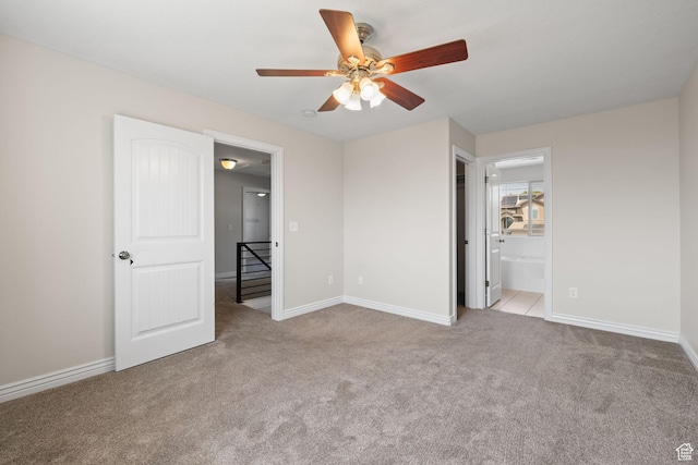 6959 S Adventure Way, West Jordan, UT 84081 - unfurnished bedroom featuring carpet flooring, ensuite bath, and a ceiling fan