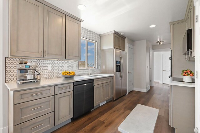 6959 S Adventure Way, West Jordan, UT 84081 - kitchen featuring stainless steel appliances, tasteful backsplash, dark wood-style floors, light countertops, and recessed lighting