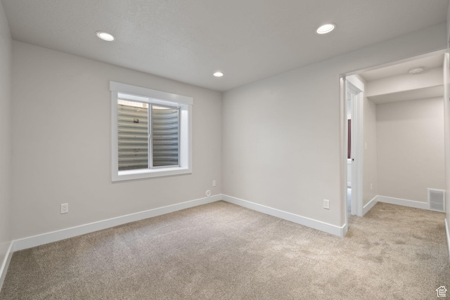 6959 S Adventure Way, West Jordan, UT 84081 - empty room featuring light colored carpet and recessed lighting