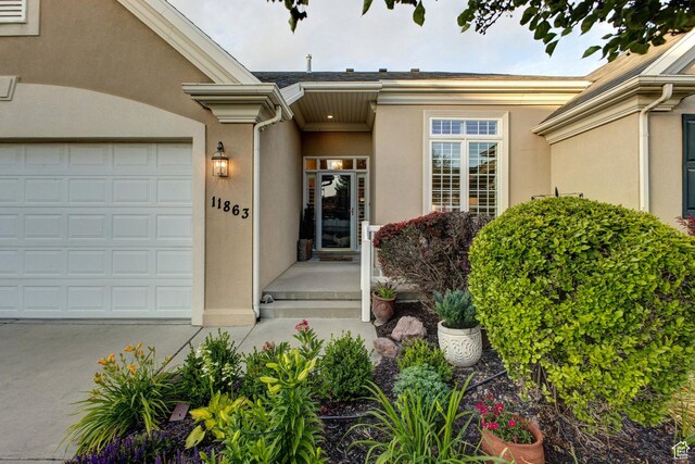 11863 S Cottage Side Way, Draper, UT 84020 - entrance to property with stucco siding, an attached garage, and driveway