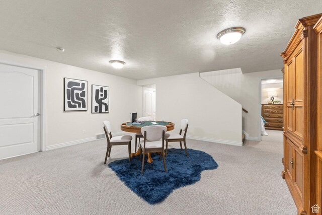 11863 S Cottage Side Way, Draper, UT 84020 - dining room with a textured ceiling, light colored carpet, and stairway