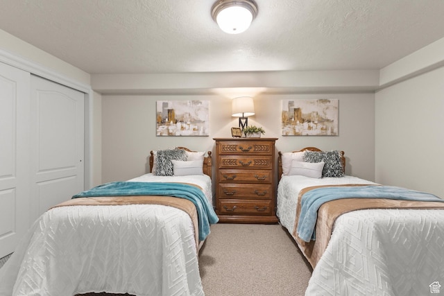 11863 S Cottage Side Way, Draper, UT 84020 - carpeted bedroom with a closet and a textured ceiling