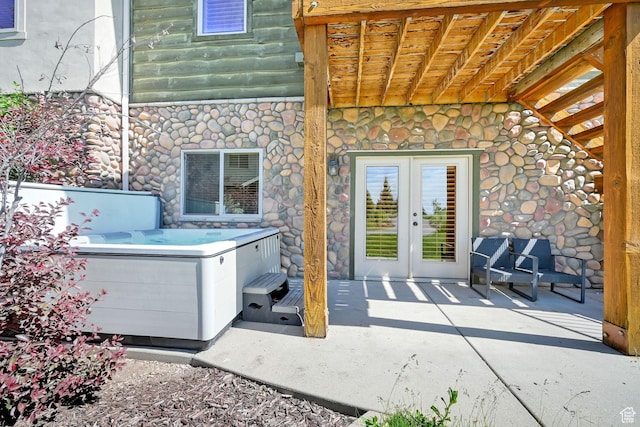 5176 E Fairview Loop Unit C505, Eden, UT 84310 - view of patio / terrace with a hot tub and french doors