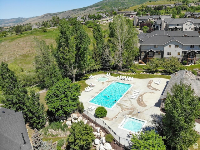 5176 E Fairview Loop Unit C505, Eden, UT 84310 - aerial view of a pool area and a mountainous background