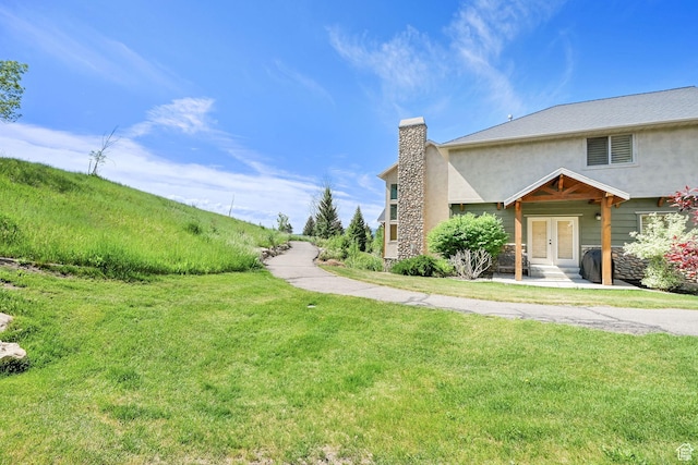 5176 E Fairview Loop Unit C505, Eden, UT 84310 - view of green lawn featuring french doors