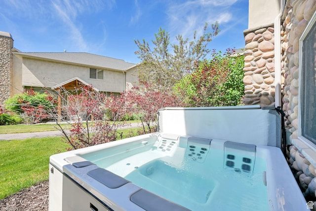 5176 E Fairview Loop Unit C505, Eden, UT 84310 - view of patio featuring a hot tub