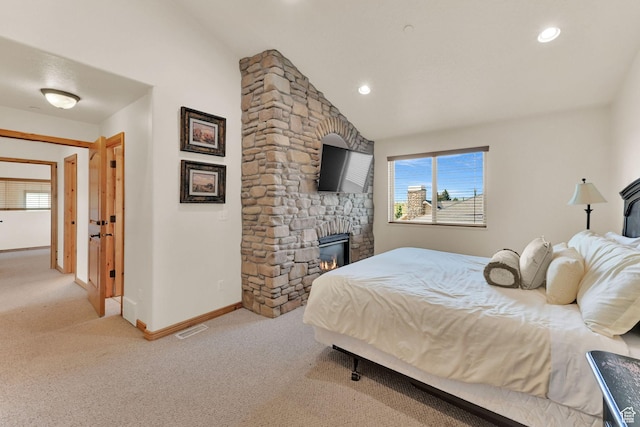 5176 E Fairview Loop Unit C505, Eden, UT 84310 - carpeted bedroom featuring vaulted ceiling, a fireplace, and recessed lighting