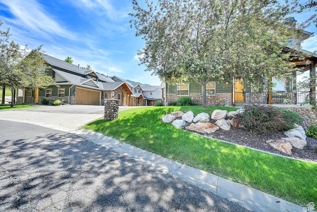 5176 E Fairview Loop Unit C505, Eden, UT 84310 - craftsman-style home with stone siding, a garage, and driveway