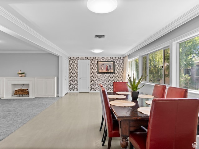 1150 E 2700 S Unit 50G, Salt Lake City, UT 84106 - dining space featuring wallpapered walls and crown molding
