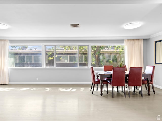 1150 E 2700 S Unit 50G, Salt Lake City, UT 84106 - dining area featuring baseboards and ornamental molding