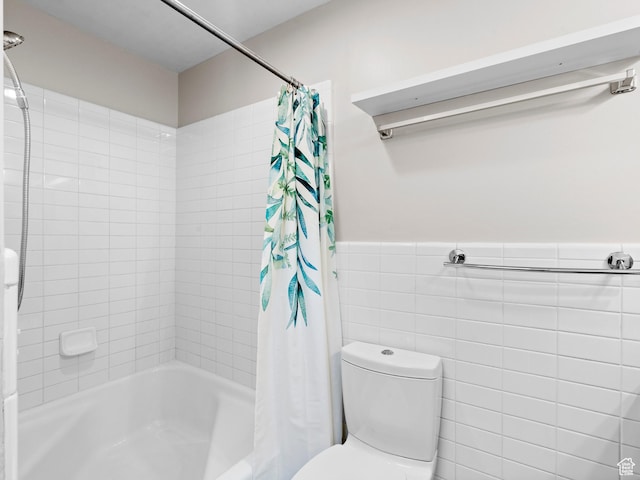 1150 E 2700 S Unit 50G, Salt Lake City, UT 84106 - full bathroom featuring shower / bath combo, wainscoting, and tile walls