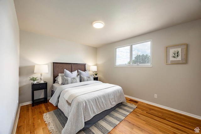 8097 S 535 E, Sandy, UT 84070 - bedroom with baseboards and wood finished floors