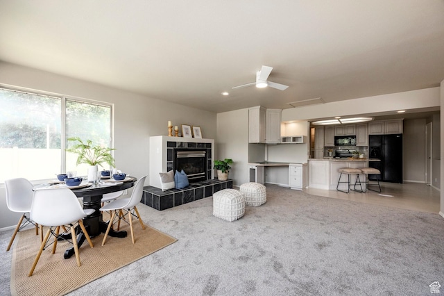 8097 S 535 E, Sandy, UT 84070 - living room featuring a tile fireplace, light colored carpet, and recessed lighting