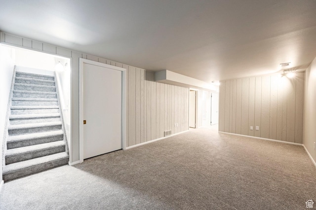 8097 S 535 E, Sandy, UT 84070 - unfurnished room featuring carpet floors, stairway, and wooden walls