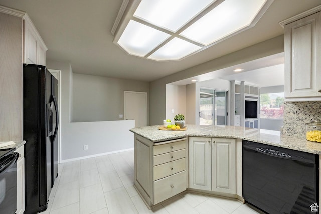 8097 S 535 E, Sandy, UT 84070 - kitchen featuring black appliances, light stone countertops, a peninsula, and backsplash