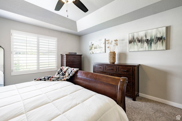 2402 W 525 S, Layton, UT 84041 - bedroom with light colored carpet, ceiling fan, and a tray ceiling