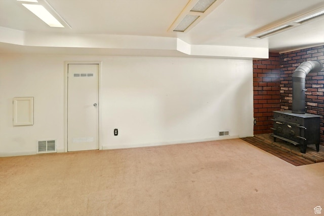 1743 N 250 W, Sunset, UT 84015 - finished below grade area featuring a wood stove and carpet