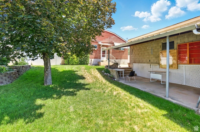 1743 N 250 W, Sunset, UT 84015 - view of green lawn with a patio