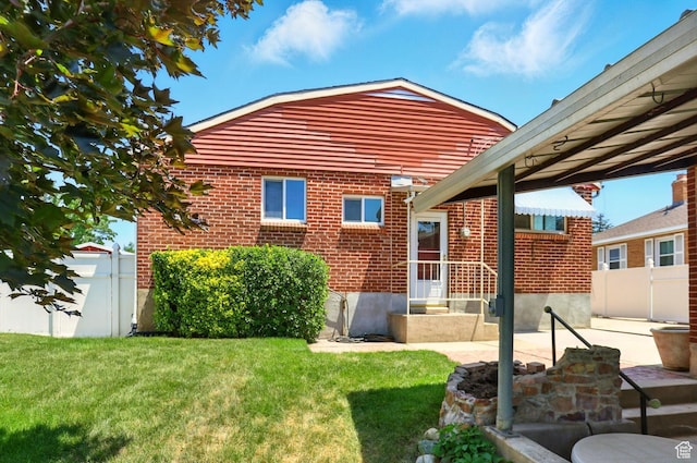 1743 N 250 W, Sunset, UT 84015 - rear view of property with brick siding