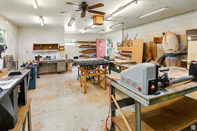 1743 N 250 W, Sunset, UT 84015 - garage with a workshop area, ceiling fan, and concrete block wall