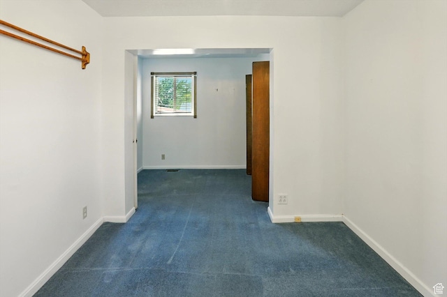 1743 N 250 W, Sunset, UT 84015 - unfurnished room with dark colored carpet